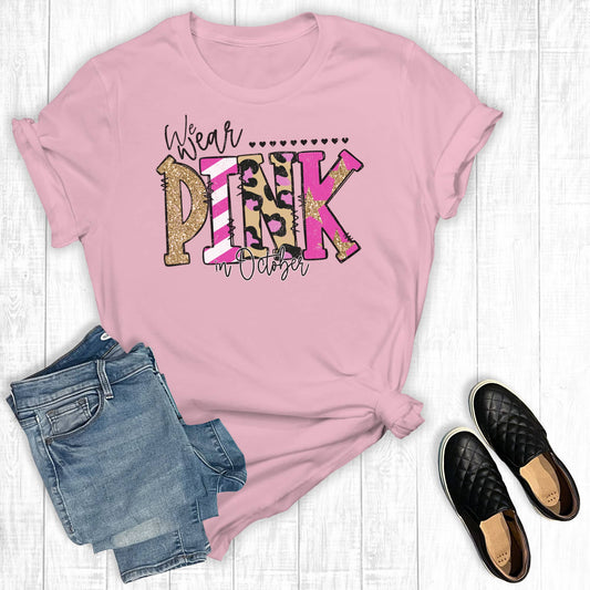 Breast Cancer We Wear Pink In October Graphic Tee: Light Pink